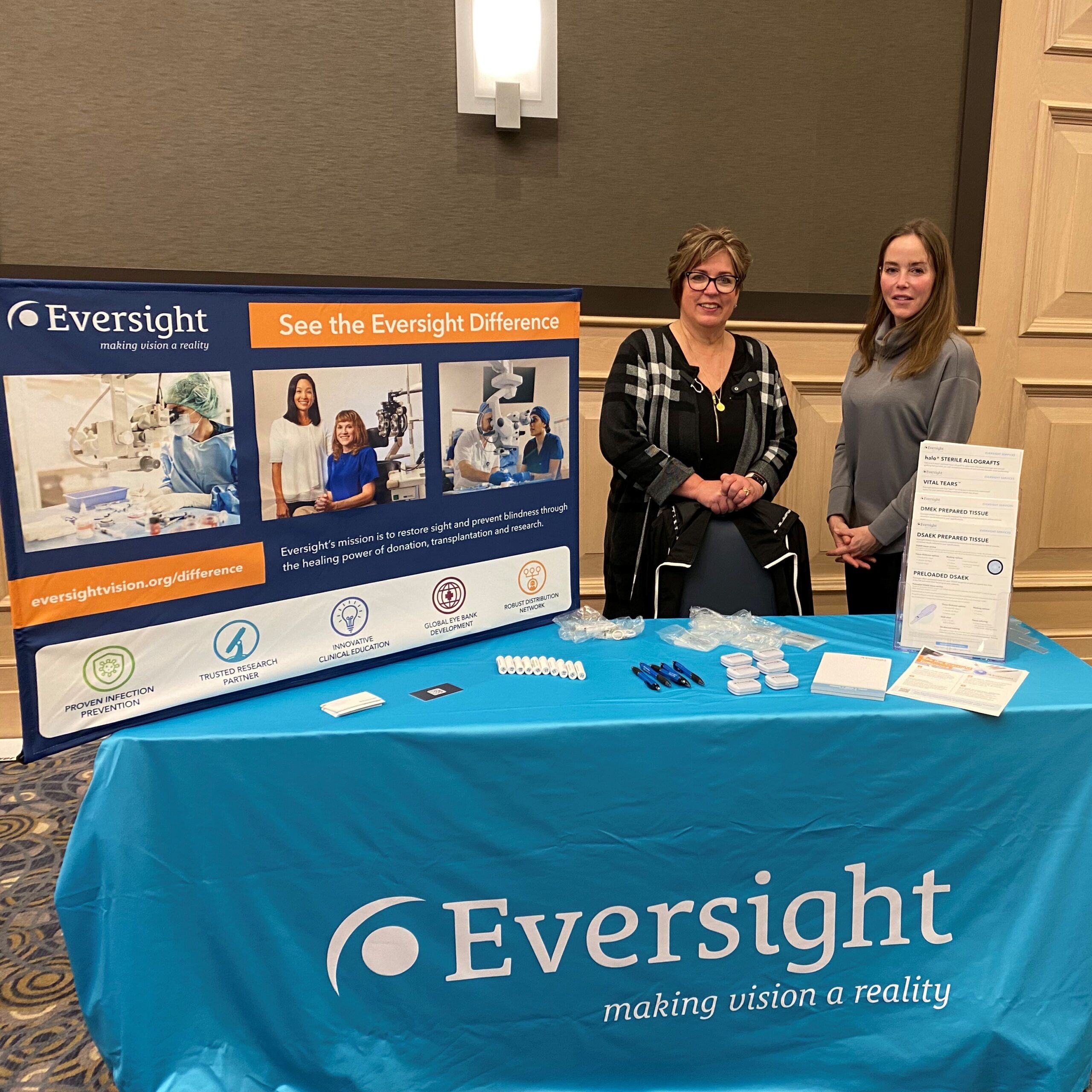 Women at an Eversight table at an event